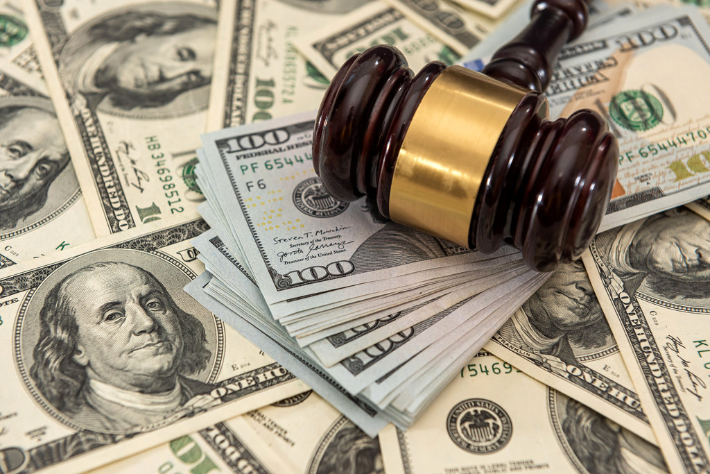 dollar money and judges gavel on table. Judgement and bribe. corruption